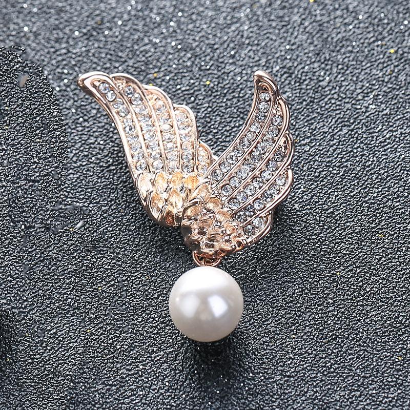 

Ретро-брошь «Крылья ангела» Темпераментный универсальный жемчужный корсаж Нишевый дизайн Sense Anti-Light Pin Аксессуары розового золота