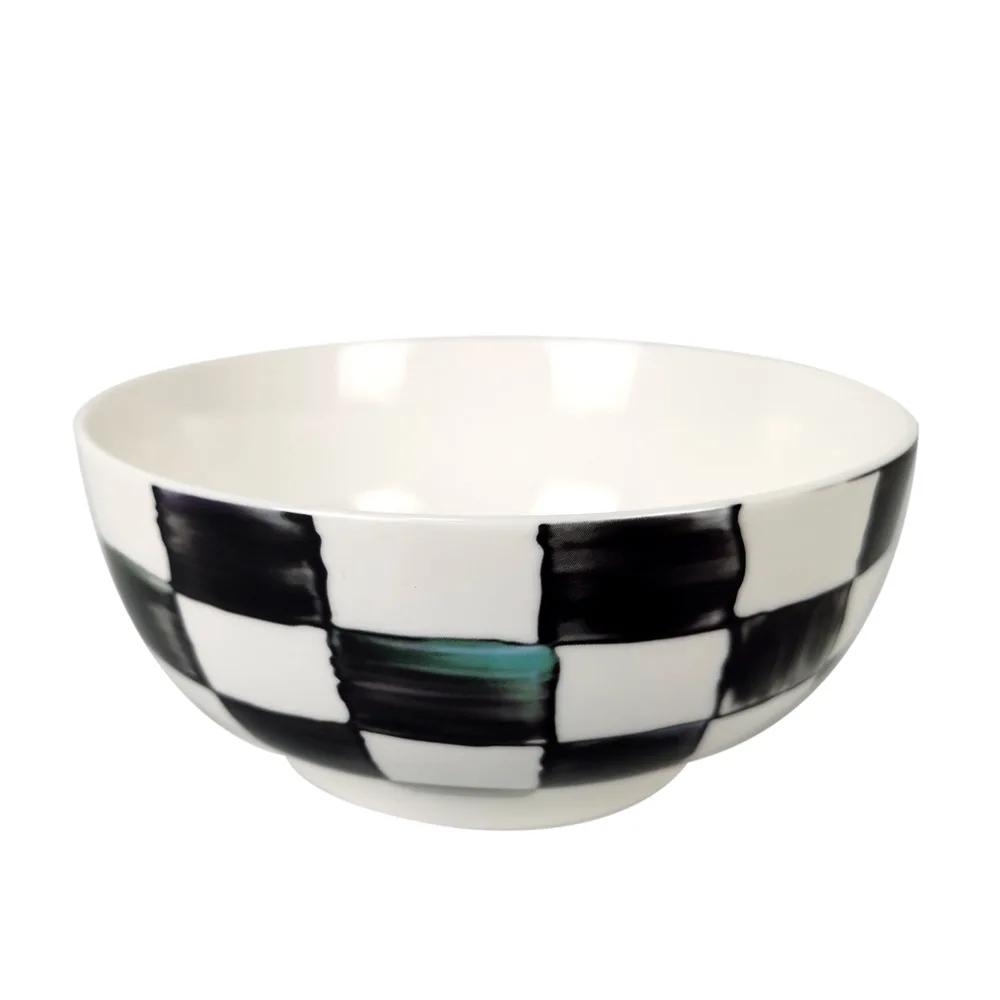 Piatto piano in ceramica a scacchi bianco e nero Tazza da caffè e piattino in bone china Piatti per cibi occidentali Stoviglie eleganti per la casa Tazza