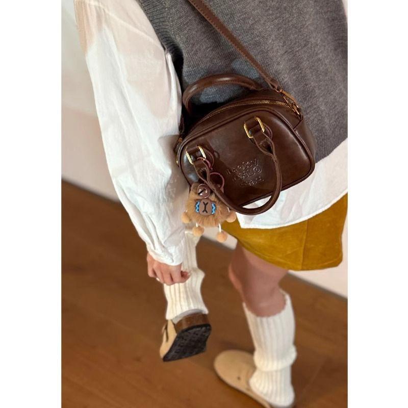 Niche retro bowling bag women's new fashion shoulder messenger bag premium texture coffee handbag
