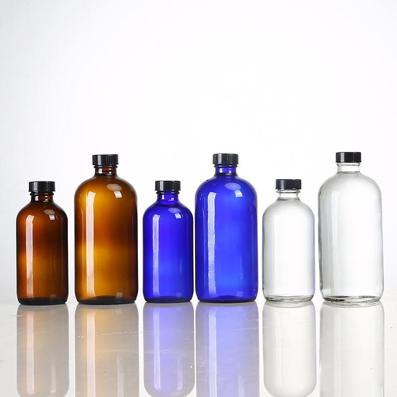 

250ml Transparent Boston Glass Bottle with Blue Essential Oil, Brown Spray, and Soap Dispenser Option (Customizable Logo). 250ml Transparent Glass