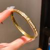 Vintage Floral Copper Bracelet With Zirconia Stones For Elegant Hand Jewelry