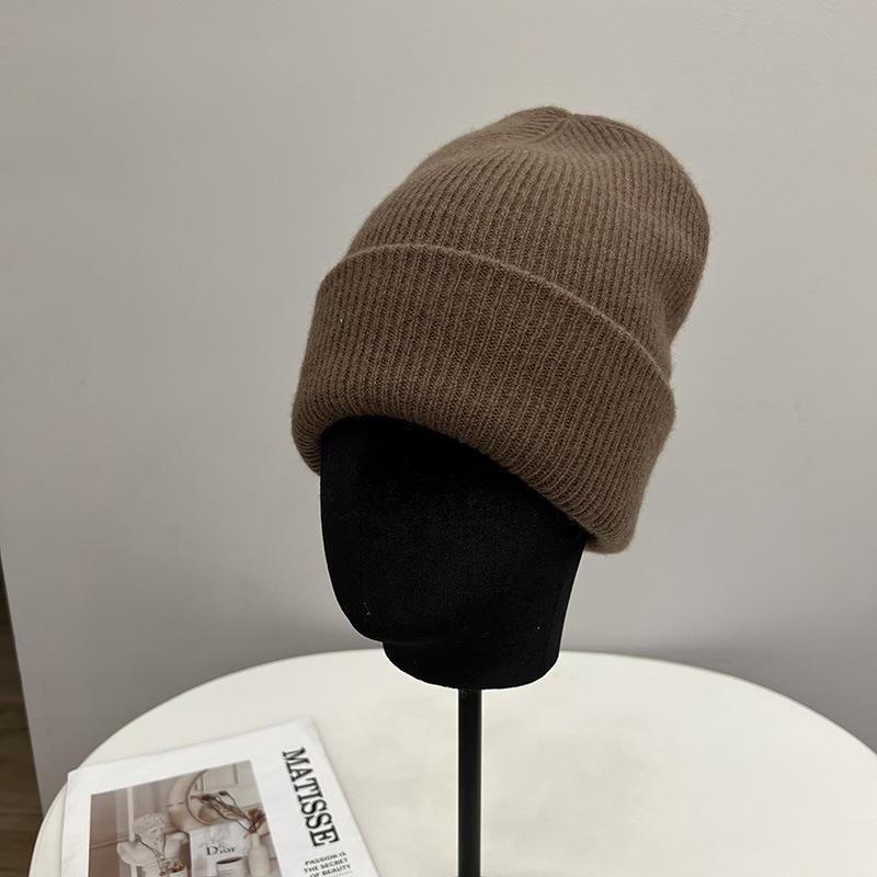 

Шерстяная вязаная шапка из гофрированной шерсти женская осенне-зимняя простая трехслойная теплая с защитой ушей холодная шапка Average size 55- 59CM темно-коричневого