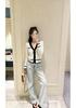 Trendy European Knit V-Neck Cardigan with Embroidered Patch and Contrasting Edges