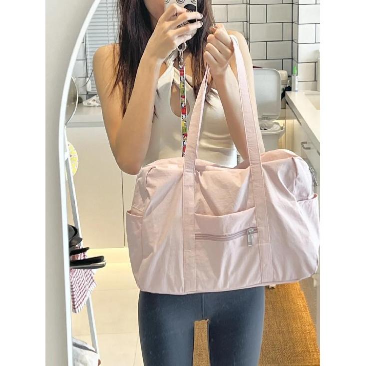 Pink casual large-capacity bag for women, new fashion commuter simple niche design travel gym bag