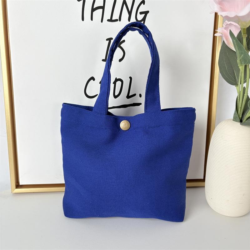 Effenkleurige eenvoudige lunchtas, draagbare canvas tas, kleine stoffen tas, draagbare canvas tas voor het opbergen van diverse spullen