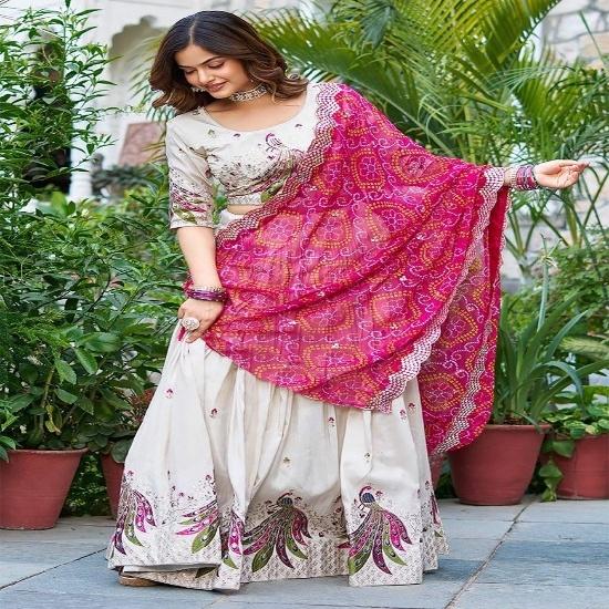 Off-White Silk Lehenga Choli with Embroidered Peacock Motifs and Pink Bandhani Dupatta UNSTITCHED
