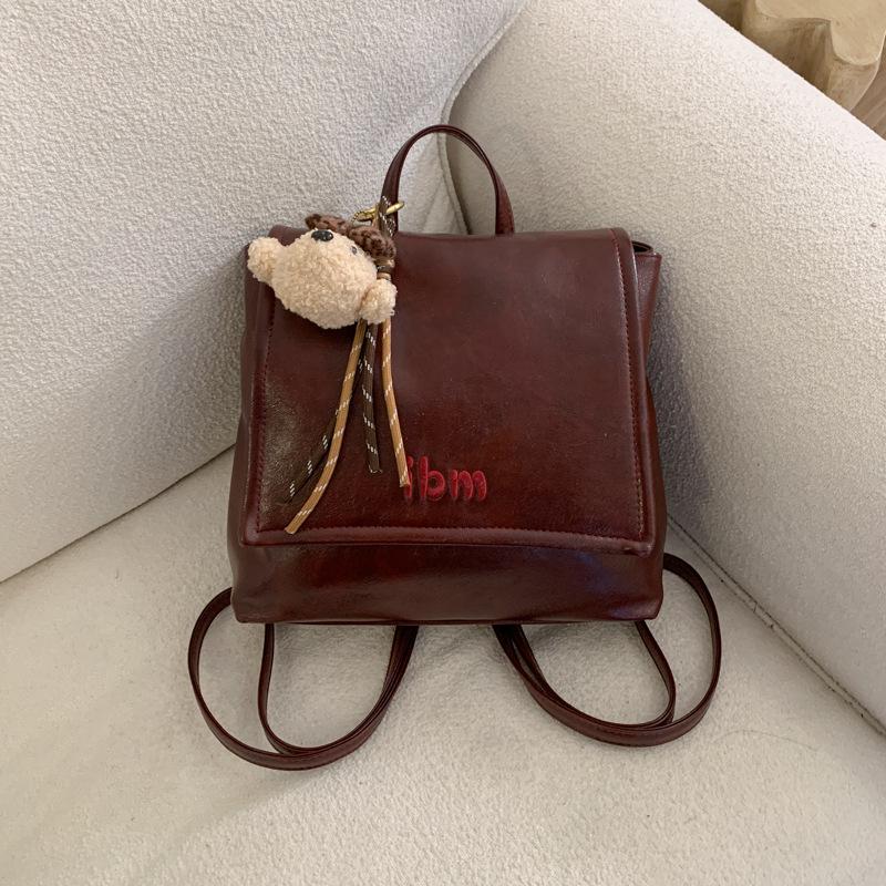 

This year, large-capacity women s bags are popular. 2025 autumn new shoulder bags are foreign trend solid color fashion backpacks for women. no pendant красный