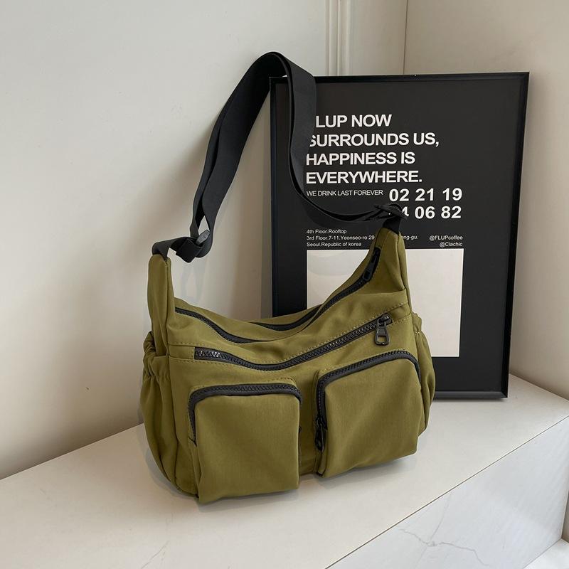

Korean version of casual large-capacity satchel women s new niche versatile single shoulder crossbody dumpling bag tooling style boys trendy bag зелёный