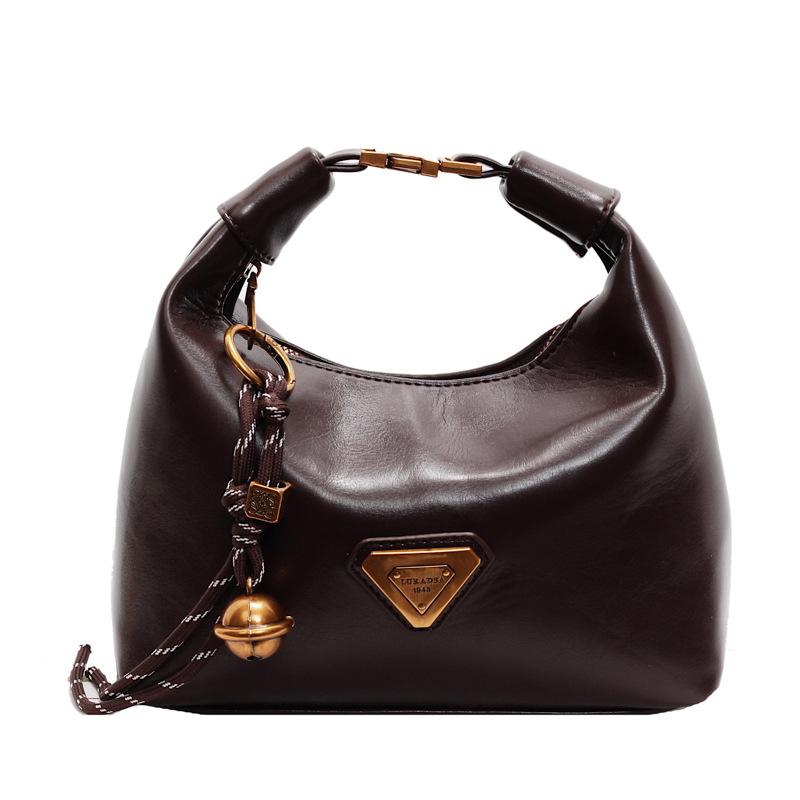 High-end niche bag women's spring retro new fashion messenger bag women's portable work dumpling bag