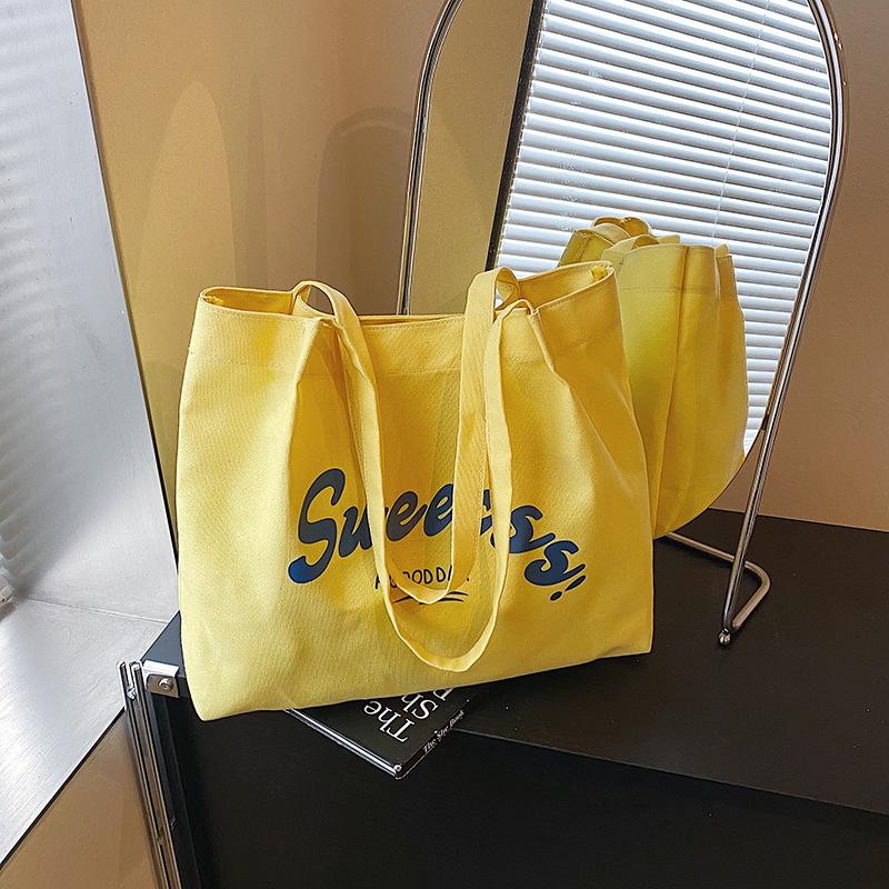 

New versatile large-capacity versatile canvas bag simple lazy style fashion shoulder tote bag жёлтый