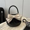 Niche design bow handbag new sense contrasting color small round bag fashionable versatile high value women