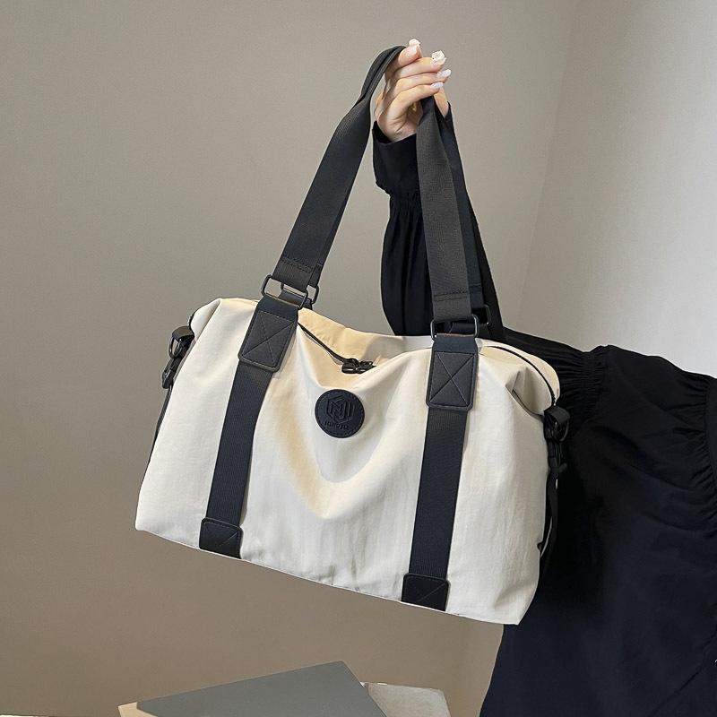Korean Version of Simple Fashion Fitness Bag Large Capacity Hand Luggage Bag Women's Sports Travel Bag Portable Trend
