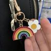 Vibrant Golden-Tone 1pc Rainbow Heart Pendant Keychain | Colorful Striped Rainbow & White Daisy Design for Phones, Cars, and Backpacks