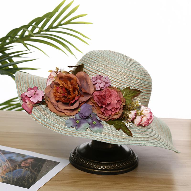 Summer new sunscreen sunshade flower straw hat women's beach travel hand-woven hat foldable big eaves hat