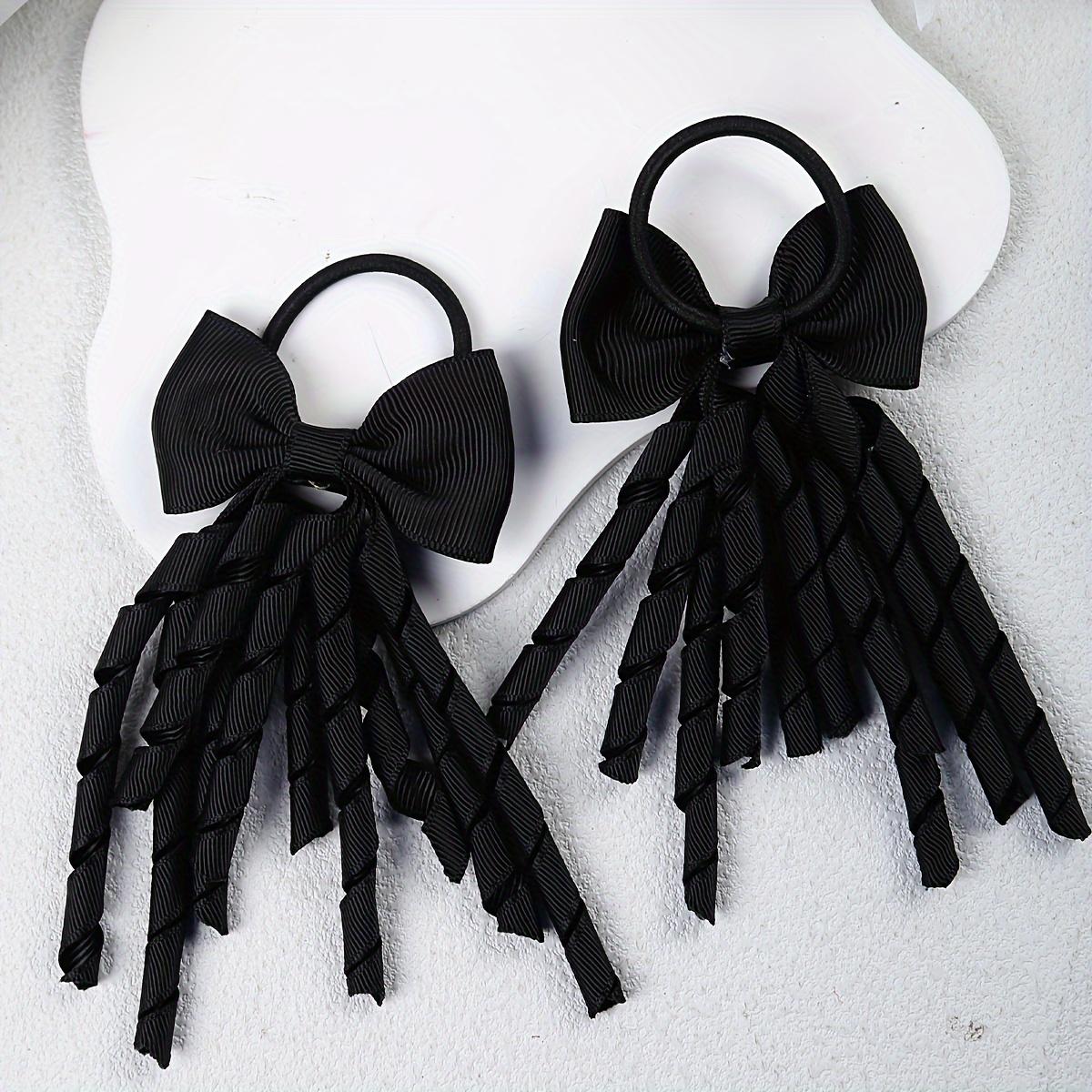 

Two Hair Accessories for Girls, Featuring Bows, Curls, Tassels, And Hair Ties for Cheerleaders. чёрный