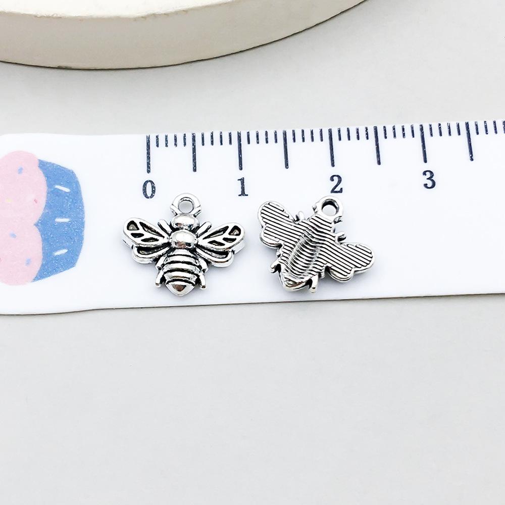 Set di 100 Ciondoli Gatto Farfalla Luna Argento Antico per Braccialetti e Collane Fai da Te
