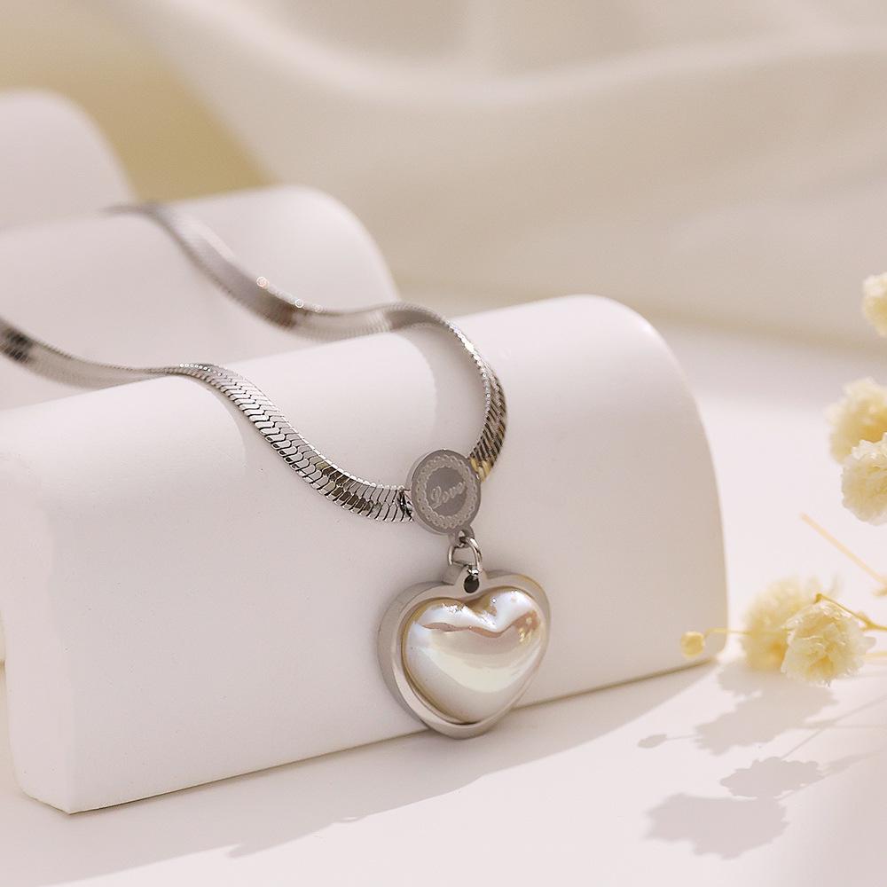 Heart Pendant Titanium Steel Necklace - Clavicle Chain with Light Luxury Peach Heart Design