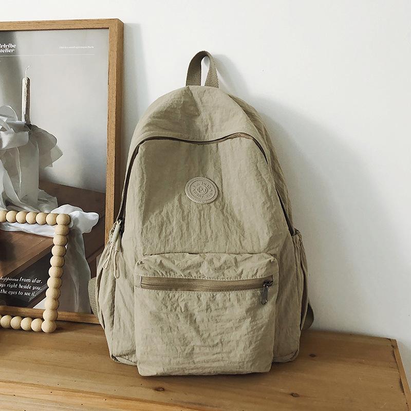 

Высококачественный, свежий и милый рюкзак конфетных цветов, легкий и вместительный рюкзак для учеников средней школы хаки