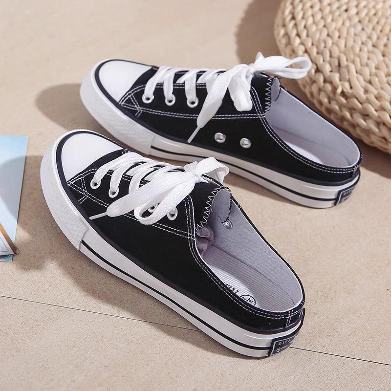 Super fire bag head half slippers women's outer wear 2025 summer new lazy thick-soled white canvas cool slippers sandals