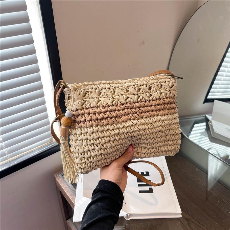 Woven straw bag women's versatile new spring and summer shoulder messenger bag seaside beach bag