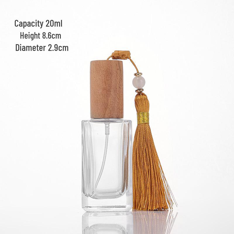 Premium 20ml Clear Glass Perfume Bottle with Spray - Portable and Refillable Decanter.