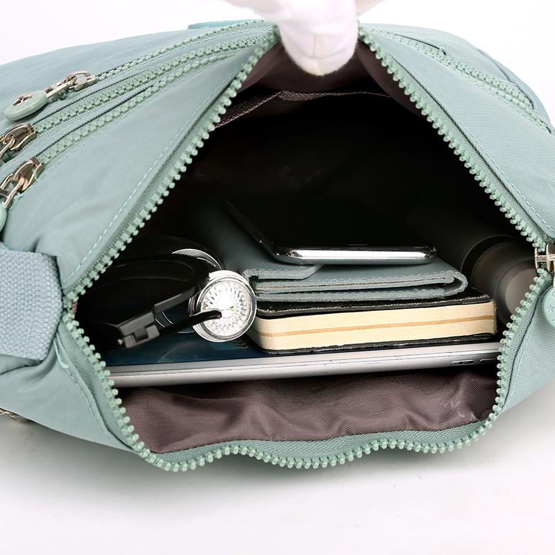 Multi Zipper Nylon Crossbody Bag With Adjustable Strap And Front Pockets For Women