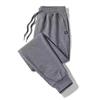 Fleece pants men's casual trousers autumn and winter new plum blossom zipper outer wear sports thermal sweatpants