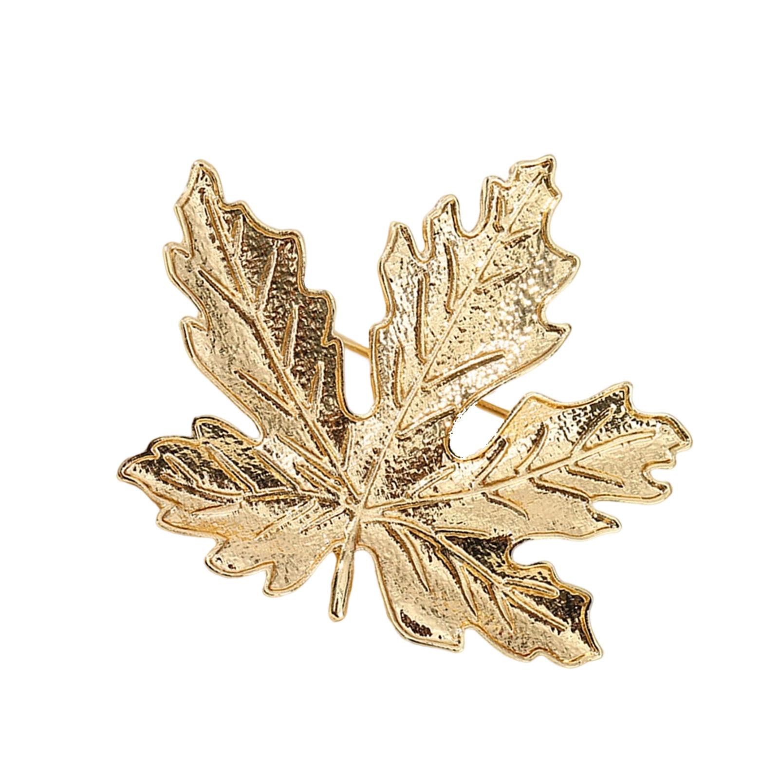 

Винтажная брошь «Кленовый лист» с античной отделкой и сверкающими стразами. Антикварные украшения для элегантного дополнения наряда. разноцветный