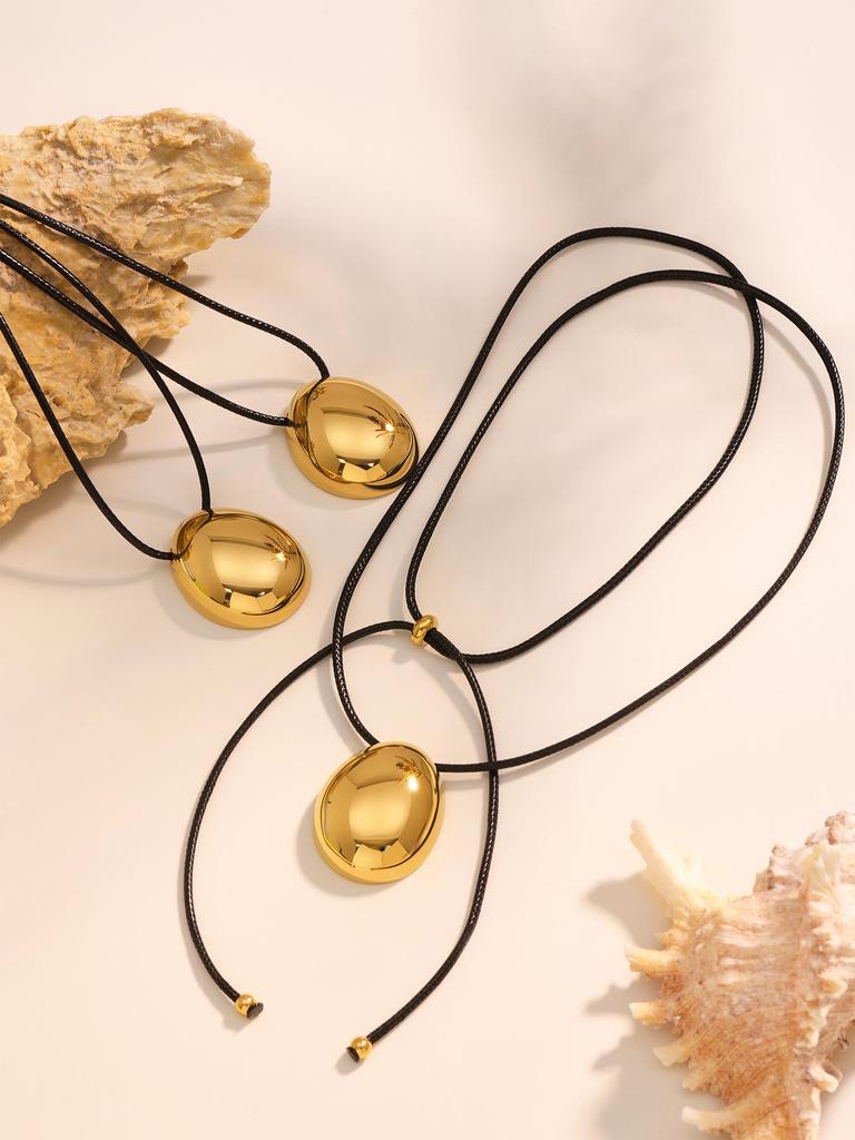 Oumika Geometric Pendant Necklace: High-Polished Stainless Steel with Black Cord, Clavicle-Length, Non-Fading, European & American Style.