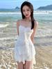 Chic Tassel Hem Low-Cut Camisole Dress: Flattering Fit and Stylish Evening Wear.