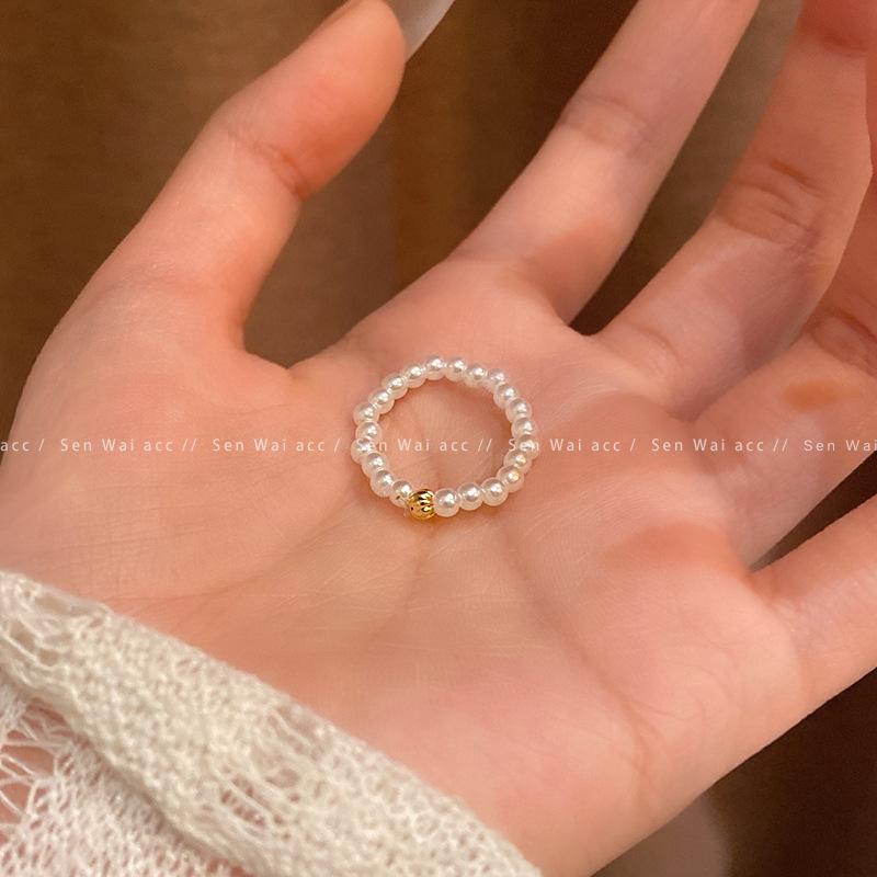 Elastic rope adjustable pearl beaded ring women's retro simple gold ball ring ring new personalized jewelry