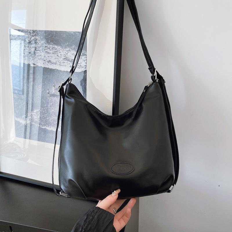 

Корейская изысканная сумка-тоут большой вместимости женская 2025 новая однотонная женская трендовая сумка-мессенджер универсальная сумка на плечо