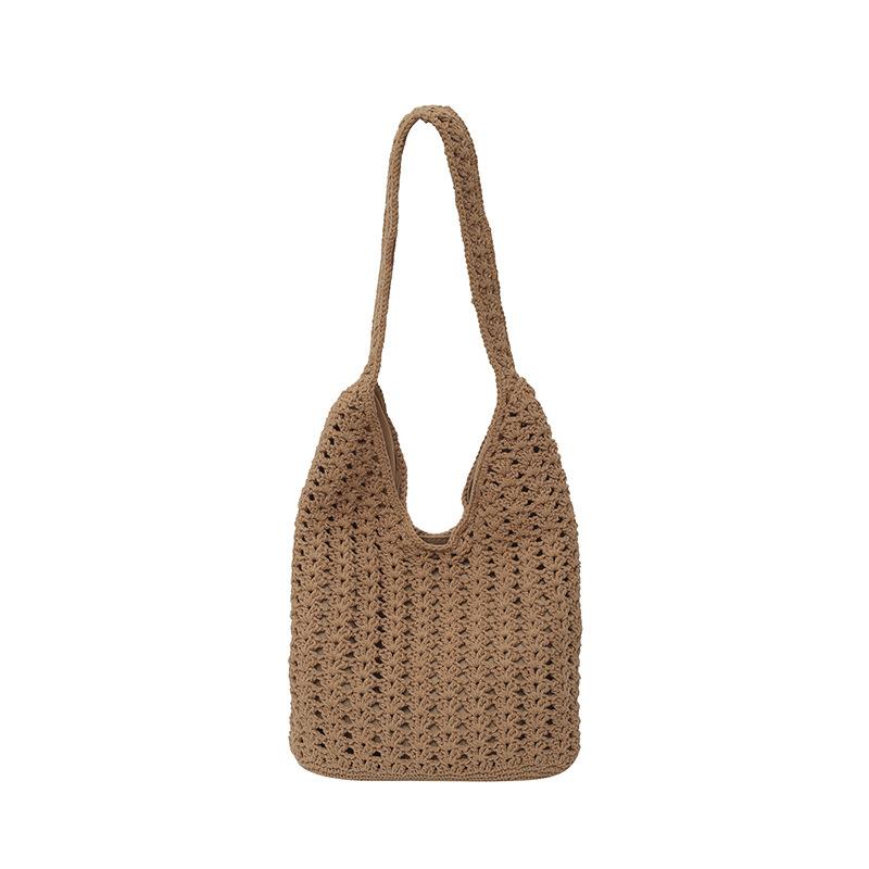 Spring hollow woven bag women's new vacation beach bag commuter shoulder tote bag knitted bag