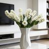 Decoração de casa – Flores e coroas artificiais