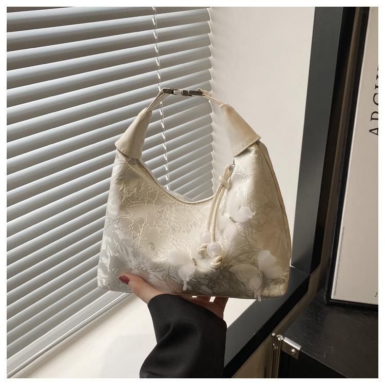 Ручная переноска Новая китайская сумка-подмышка Женская 2025 Весна Нишевый дизайн На плечо Кроссбоди Женская сумка-подушка