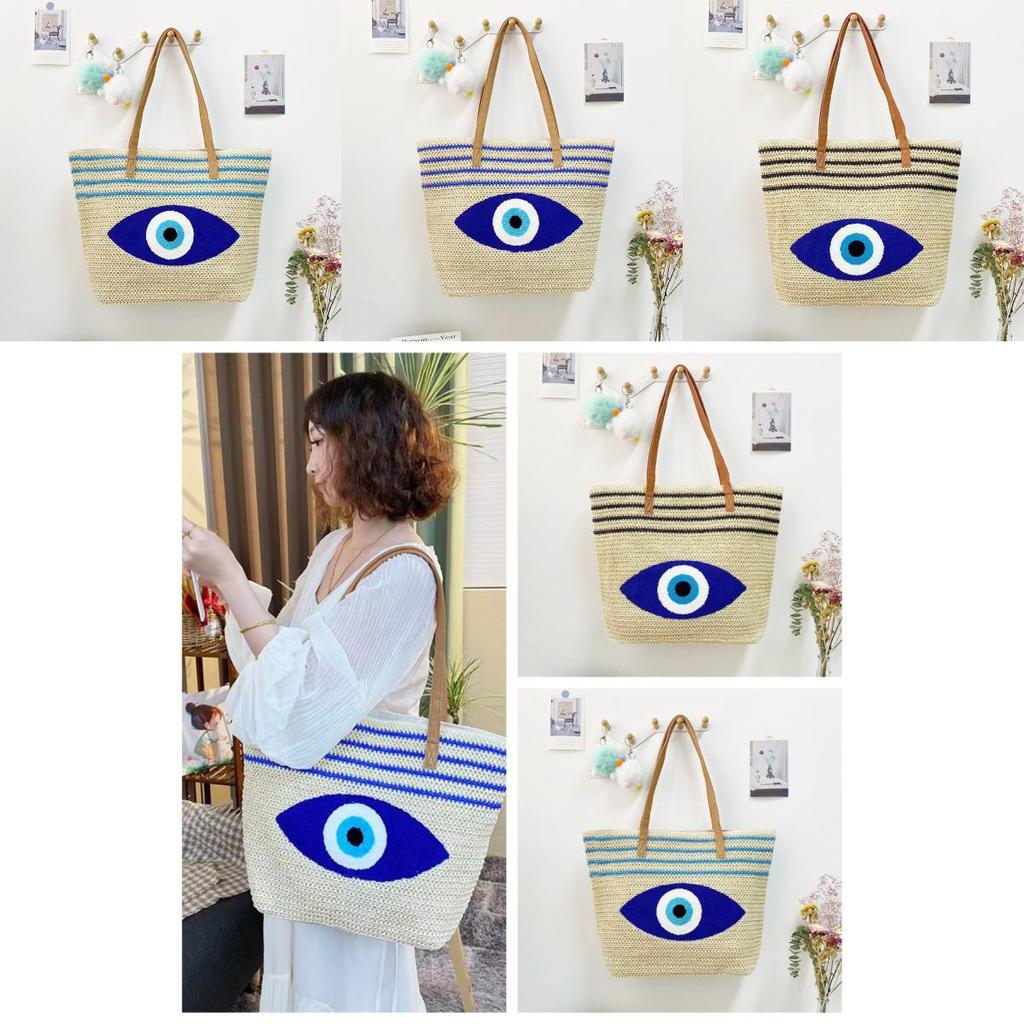 Umweltfreundliche Stroh-Schultertasche mit blauem Augen-Stickdesign für Sommerausflüge