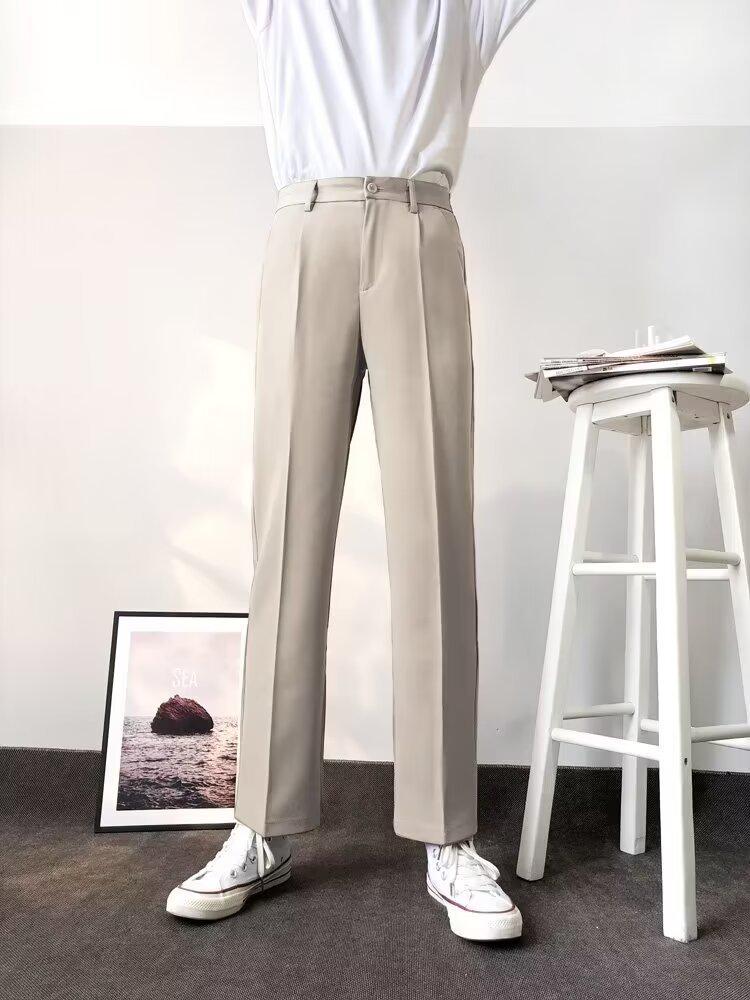 

Мужские черные эластичные брюки прямого кроя с драпировкой L