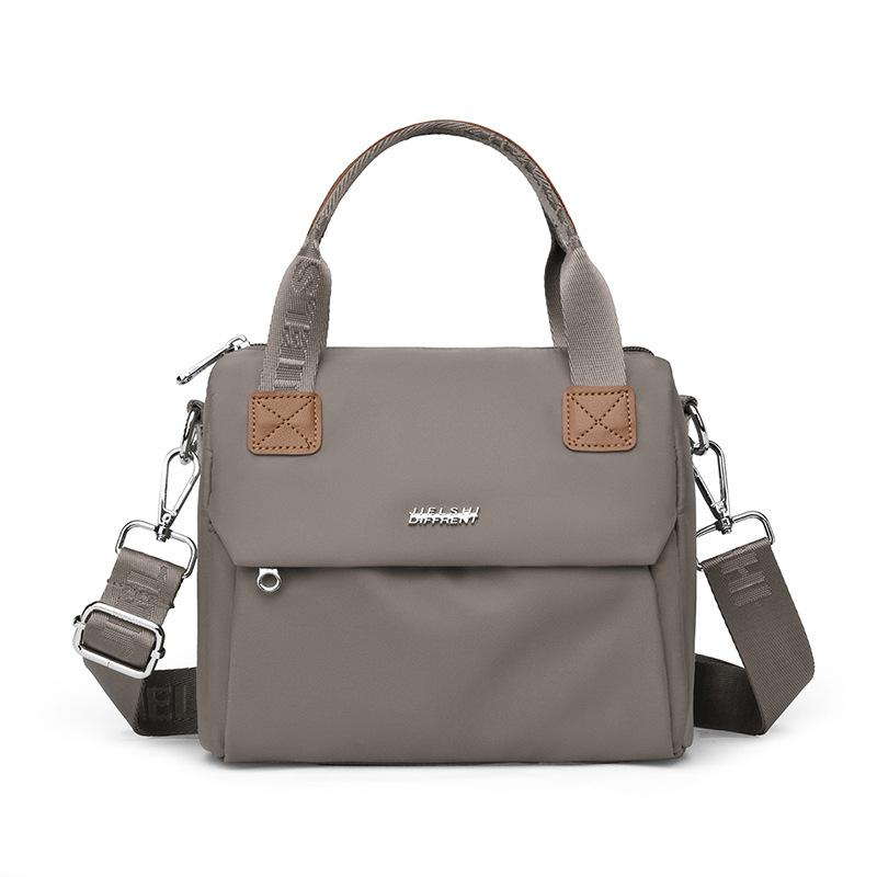 

Женская сумка Новый стиль Сумка-мессенджер Нейлоновая сумка Сумка-тоут Продвинутая ниша Большая вместимость Сумка на плечо 22*12*18cm