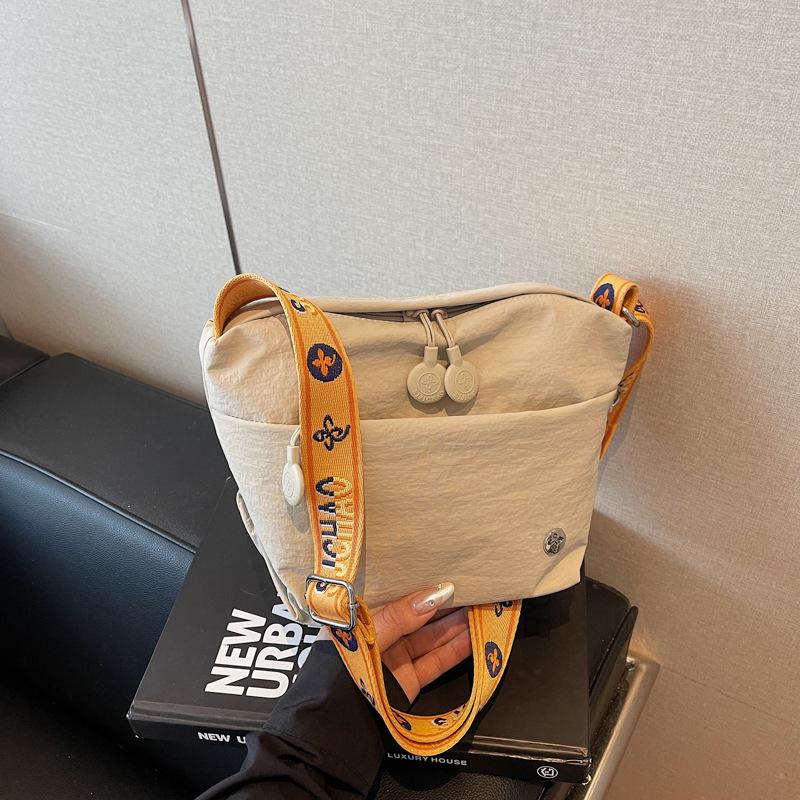 

Casual canvas small bag women s new summer color contrast lightweight shoulder bag broadband messenger small square bag