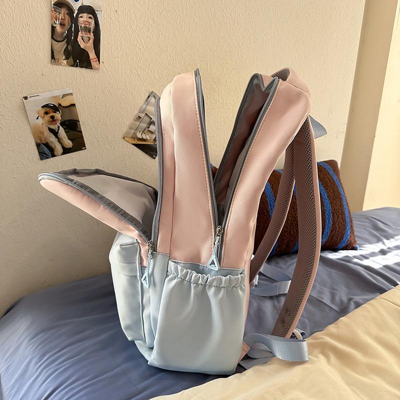 Schoolbag high value large capacity backpack female universal student schoolbag waterproof wear-resistant pain bag light fashion backpack wholesale