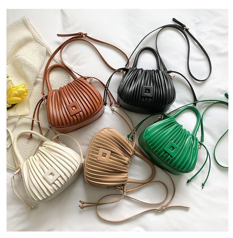 Niche portable new textured small bag, shell bag, wrinkled women's bag, textured design, shoulder bag, versatile messenger bag.