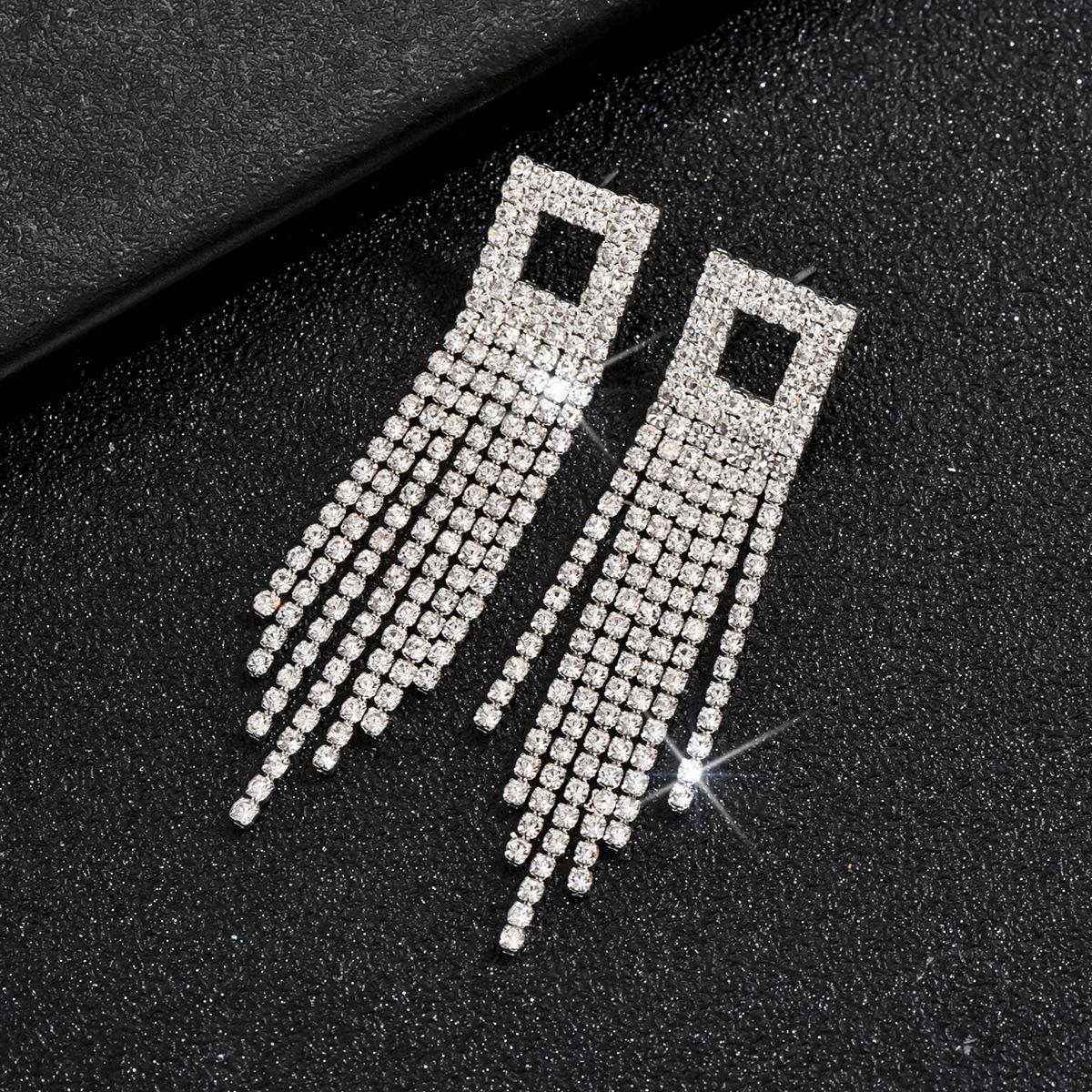 Новые длинные серьги с бахромой, инкрустированные бриллиантами, преувеличенные серьги-гвоздики с бриллиантами в стиле «любовь» в стиле «супер-блеск» в европейском и американском стиле