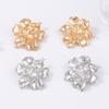 Exaggerated retro, simple, light luxury, cold style, alloy flower within flower, unique shape, floral stud earrings for women