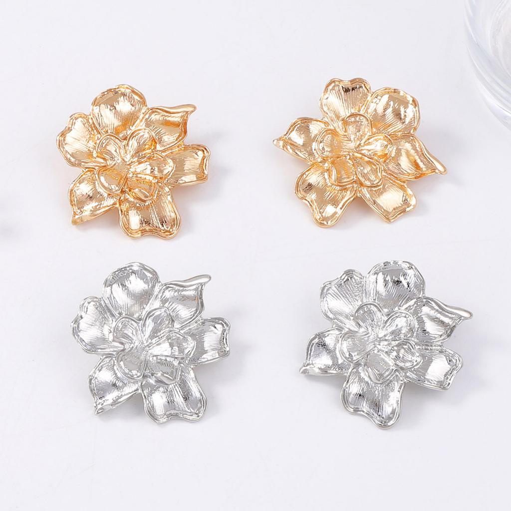 Exaggerated retro, simple, light luxury, cold style, alloy flower within flower, unique shape, floral stud earrings for women