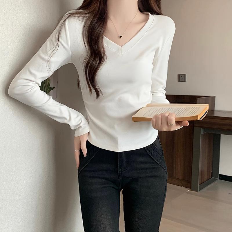 Korean v-neck slim design niche long-sleeved T-shirt for women spring and autumn irregular hem waist short hot girl top
