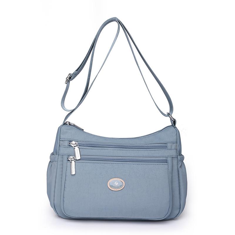 Bag 2025 new shoulder messenger bag nylon bag casual dumpling bag women's bag trend light luxury