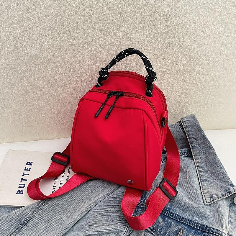 

Niche design simple shell bag women s new casual versatile shoulder messenger bag double shoulder small backpack красный