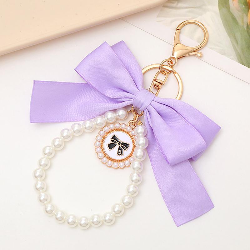 

Жемчужина Бабочка узел брелок кулон для женщин сумка подвесные украшения аксессуары автомобиль кулон телефон цепочка фиолетовый