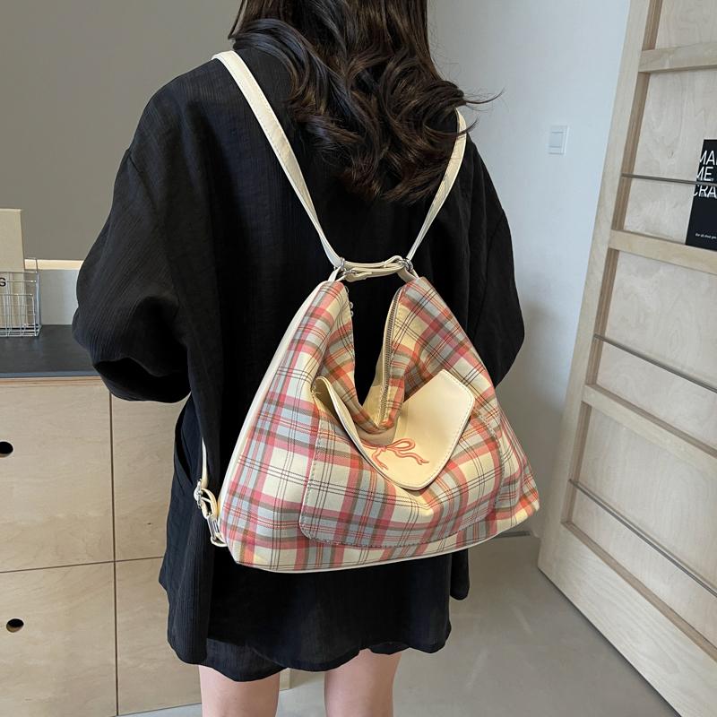 Version kontrastierende gestreifte Tragetasche für Damen Sommer neue Mode Akademie-Stil Schleife einzelne Schultertasche Premium