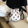 Versatile niche design polka dot drawstring bucket bag women's new commuter bag single shoulder messenger bag